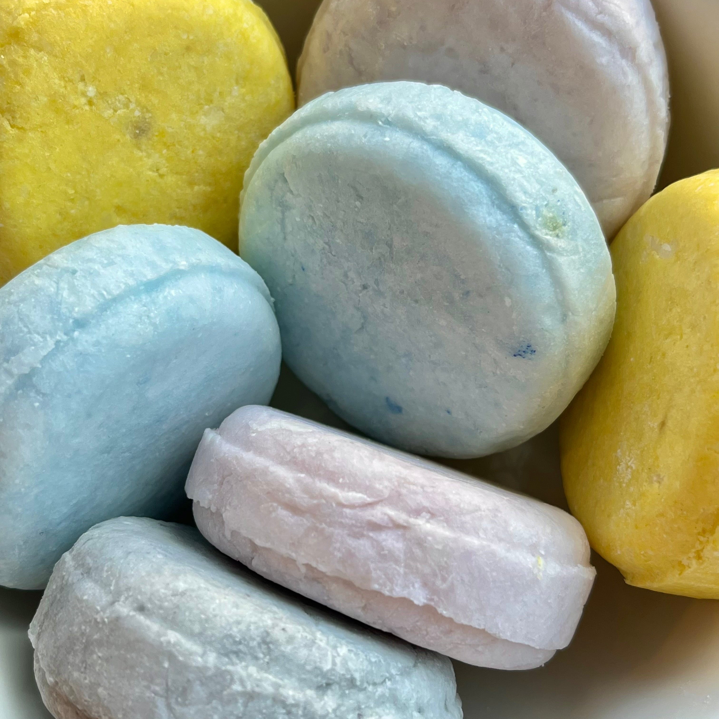 Handcrafted solid syndet shampoo bars by Rayne Refillery in four scents — zero waste, plant-based, pH-balanced natural hair care